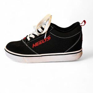 Heely’s youth size 5 pro 20 black sneakers with red and white stitching